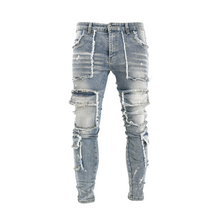 Load image into Gallery viewer, Torn Tactics Multi-Patch Distressed Jean
