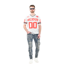 Load image into Gallery viewer, Torn Tactics Multi-Patch Distressed Jean
